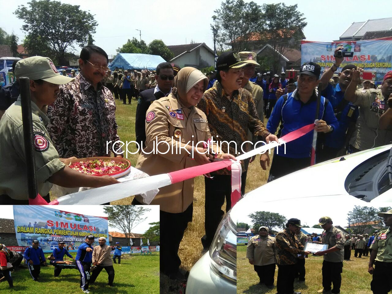 LAUNCHING - Kepala Dinas Sosial Propinsi Jawa Timur, Dr Sukesi mengguting pita didampingi Wakil Bupati Sidoarjo, Nur Ahmad Syaifuddin saat melaunching Smart Mobile Social serta Wabup menyerahkan penghargaan ke anggota Tagana, Kamis (29/03/2018).