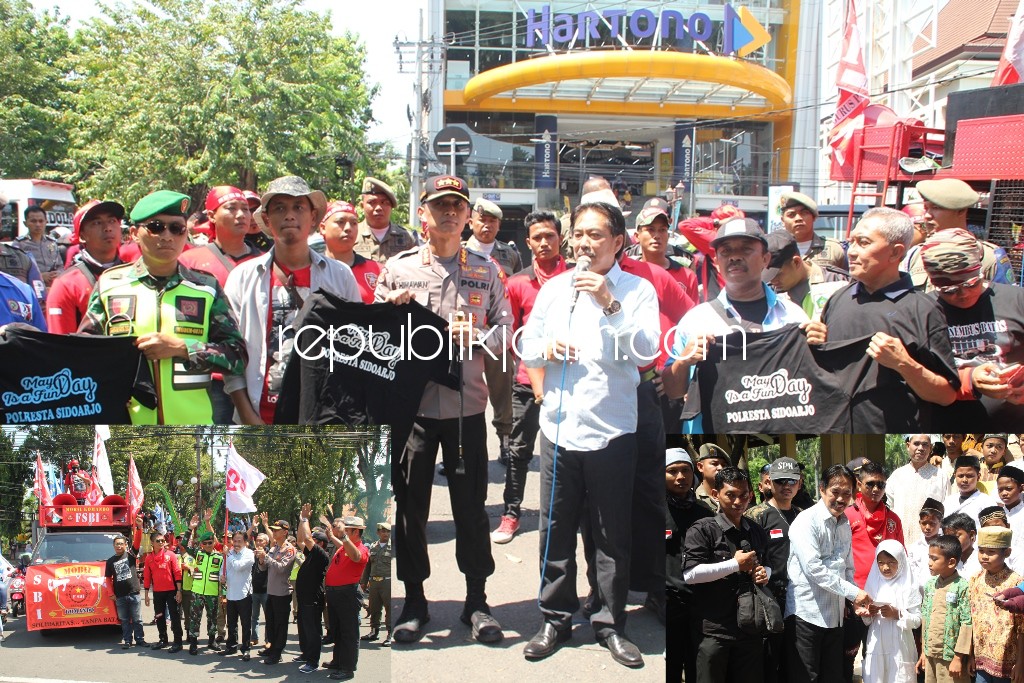 BERANGKATKAN - Wakil Bupati Sidoarjo, Nur Ahmad Syaifuddin memberangkatkan ribuan buruh asal Sidoarjo yang hendak berdemo ke Grahadi Surabaya dalam rangka Hari Buruh, Selasa (01/05/2018).