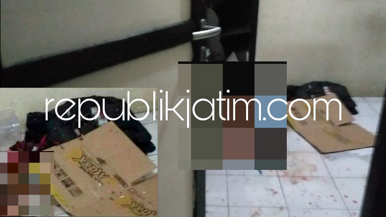 PEGANG SWITCHING - Terduga perakit bom, Anton Ferdiantono (47) tangannya masih memegang switching (pemicu) bom rakitan sebelum akhirnya ditembak petugas, Minggu (13/05/2018) malam.