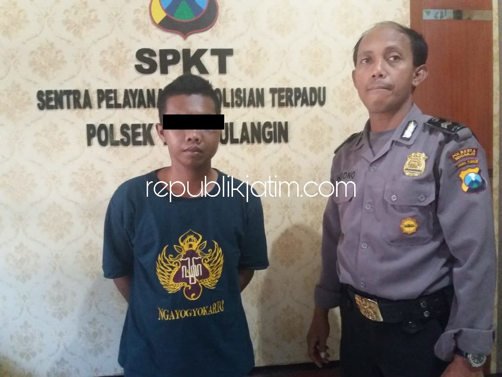 TERSANGKA - Petugas Polsek Tanggulangin menunjukkan tersangka penipuan dan penggelapan, Widianto yang ditahan petugas, Selasa (28/08/2018).