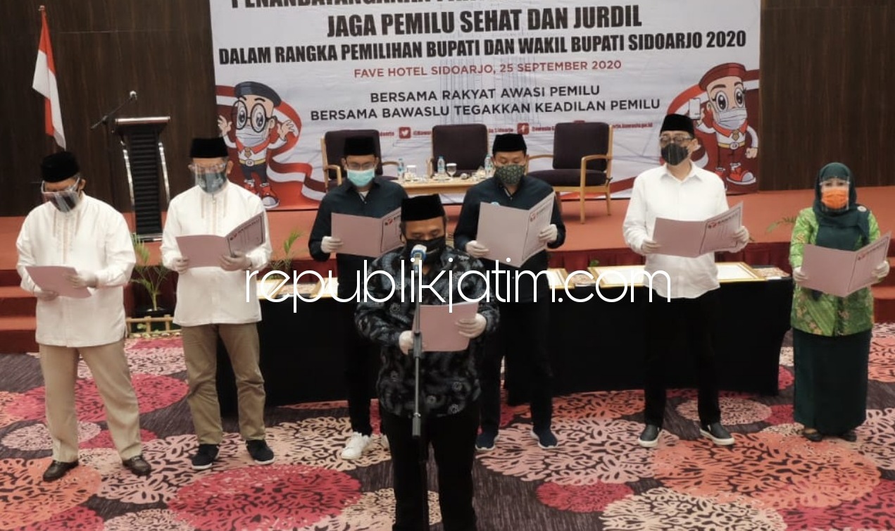DEKLARASI - Tiga Paslon Bupati dan Wakil Bupati yang bakal bertarung dalam Pilkada 9 Desember 2020 mengikuti deklarasi Pilkada Sehat dan Jurdil yang digelar Bawaslu Sidoarjo di Fave Hotel Sidoarjo, Jumat (25/09/2020).